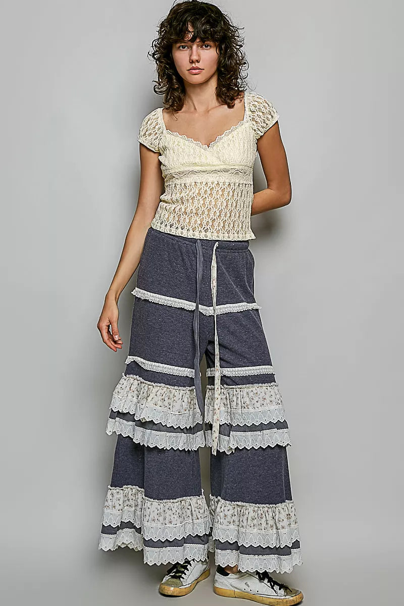 Natural lace sweetheart-neck short-sleeve peplum top with textured lace bodice