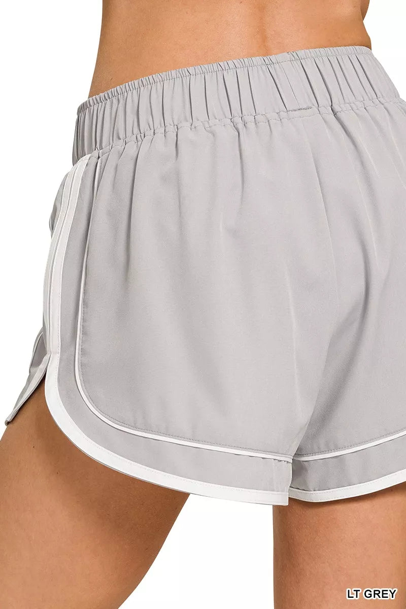 LT GREY lined dolphin shorts, back view with elastic waistband and contrast edging