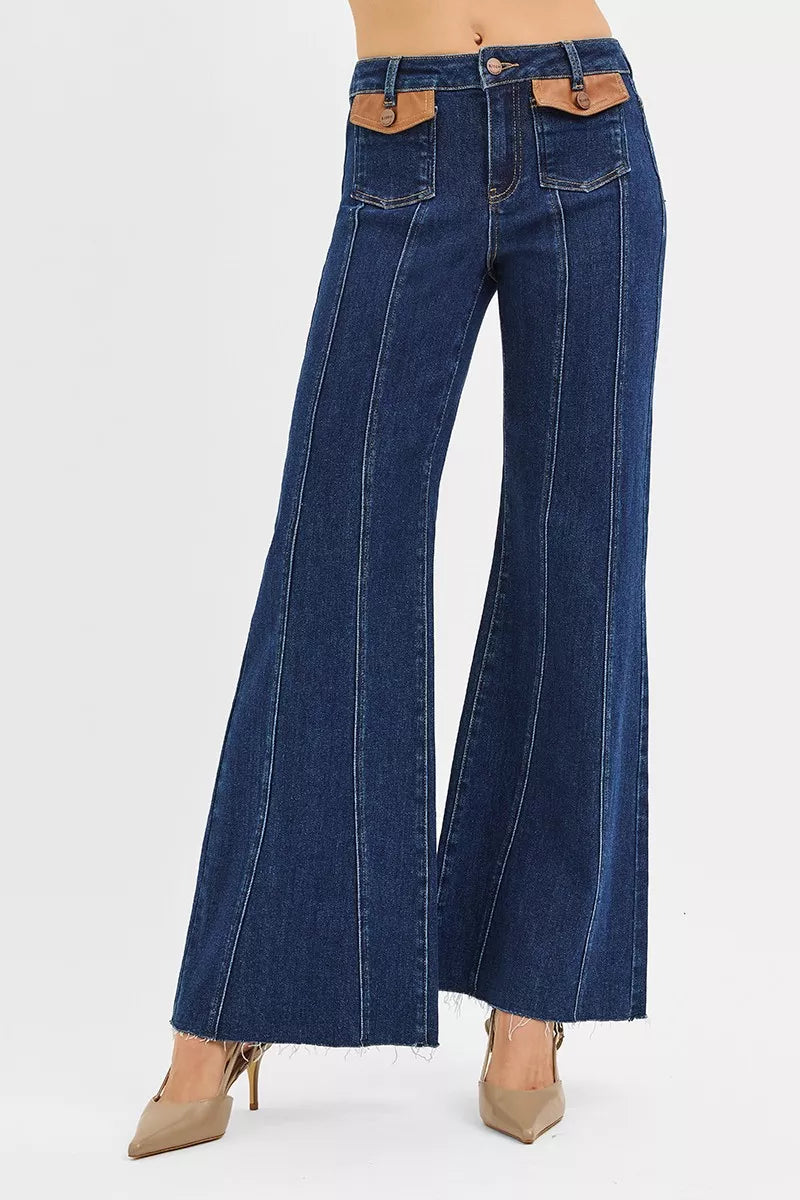 Dark blue high-rise wide flare jeans with contrast leather pocket tabs