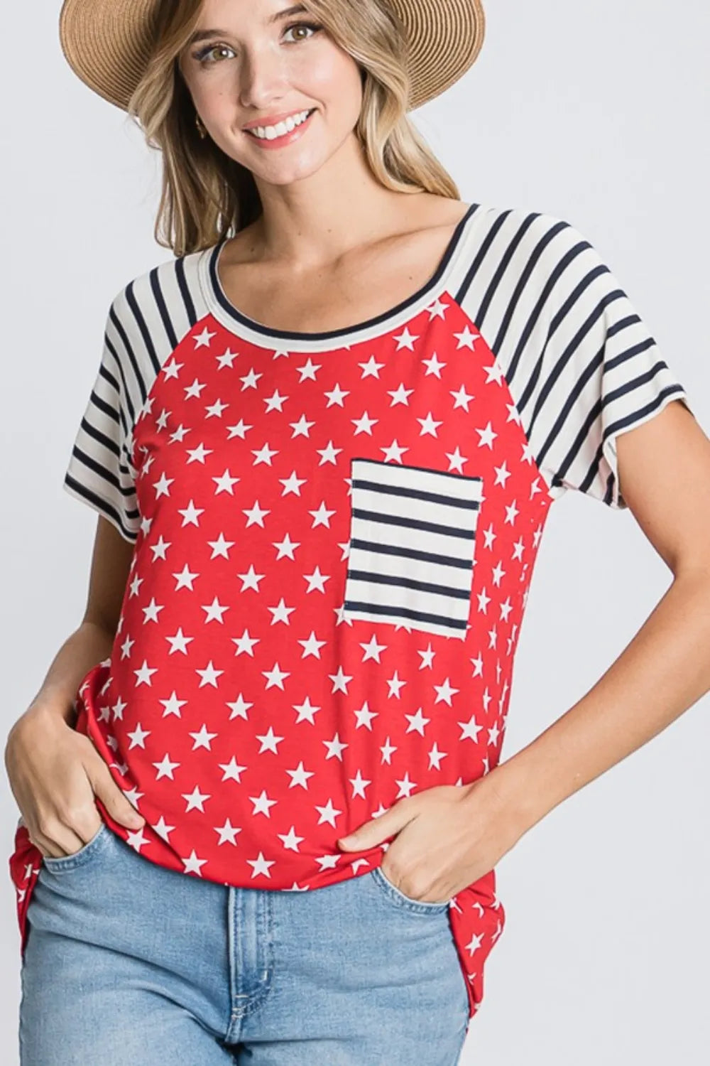 Red star print tee with navy striped sleeves and chest pocket detail