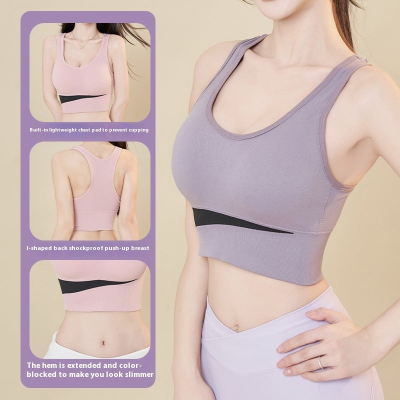 Wire-free sports bra vest in blush pink with wide underband and curved extended hem