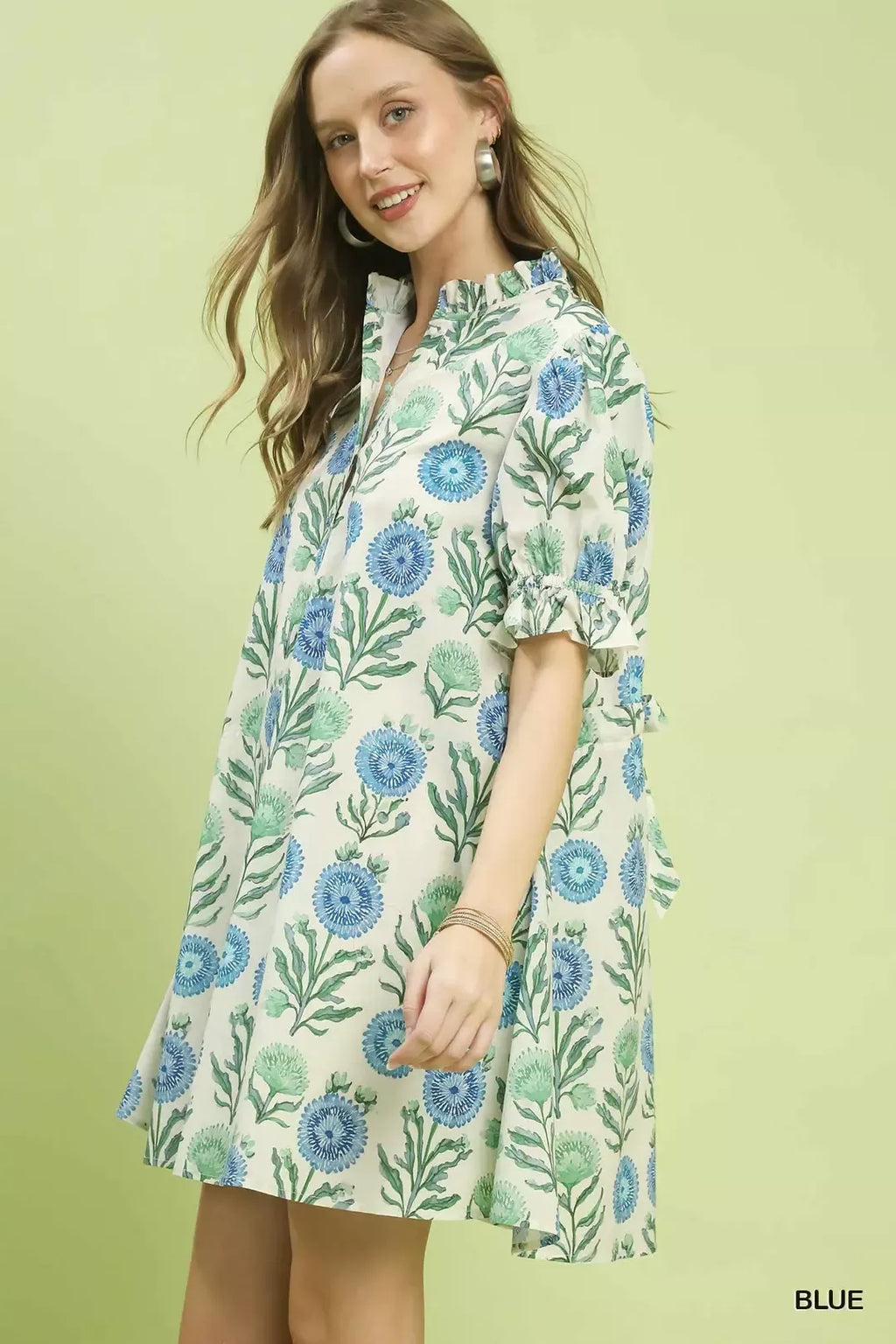 Blue floral babydoll dress with short puff sleeves and gathered waist