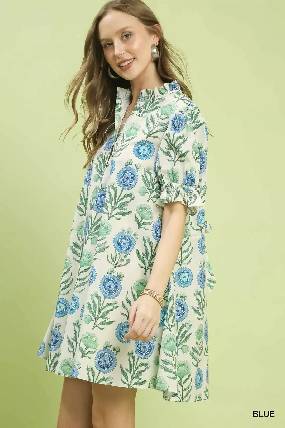 Blue floral babydoll dress with short puff sleeves and gathered waist