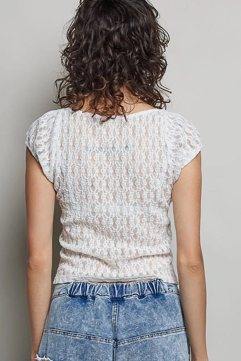 Off-white lace short-sleeve top with scalloped back neckline and openwork fabric