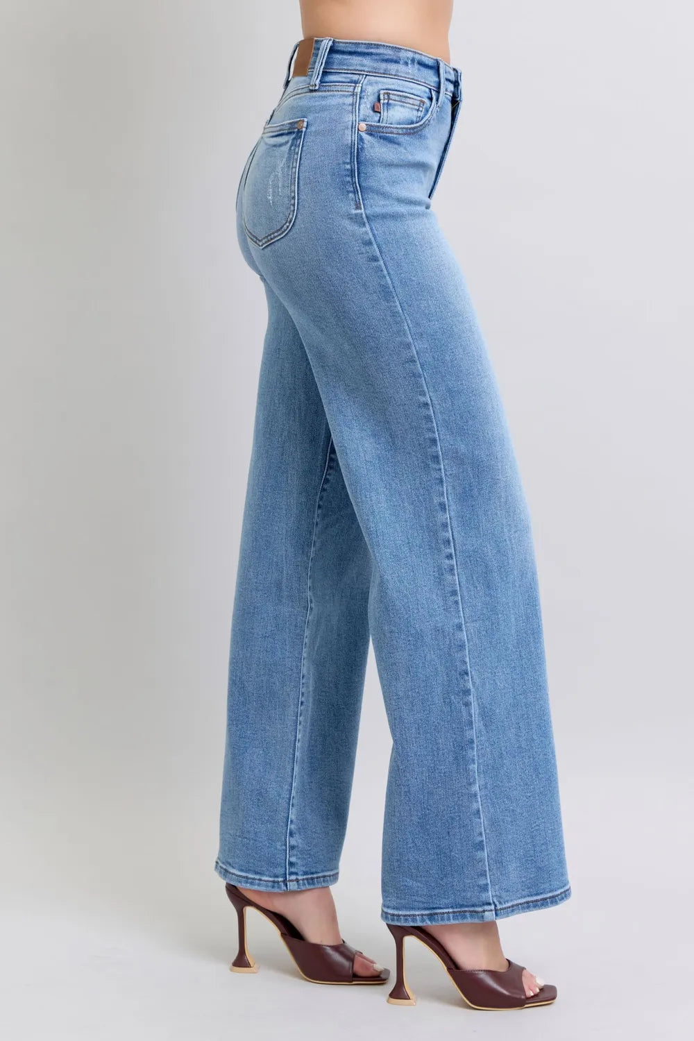 Medium wash wide-leg jeans, back view with yoke seam and rear pockets