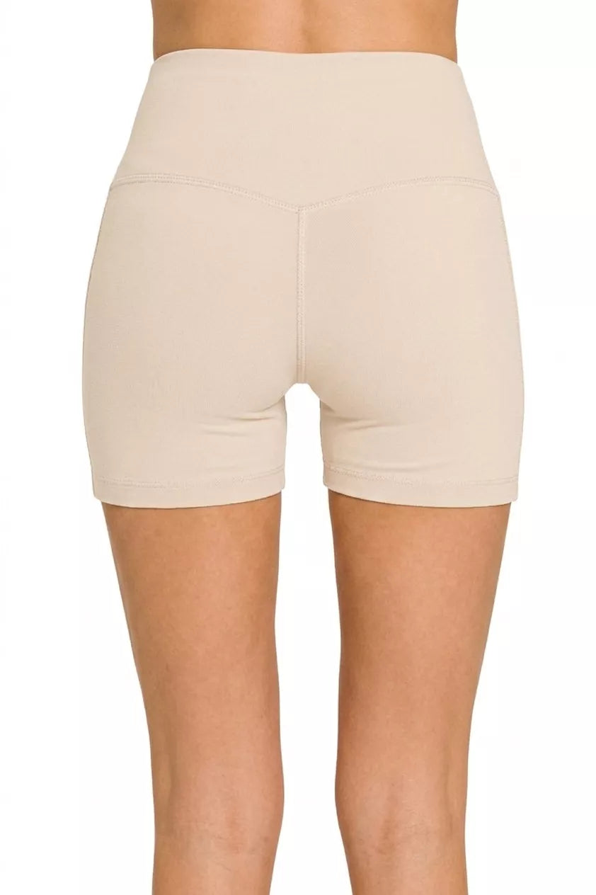 Back view: sand beige brushed microfiber biker shorts with wide waistband