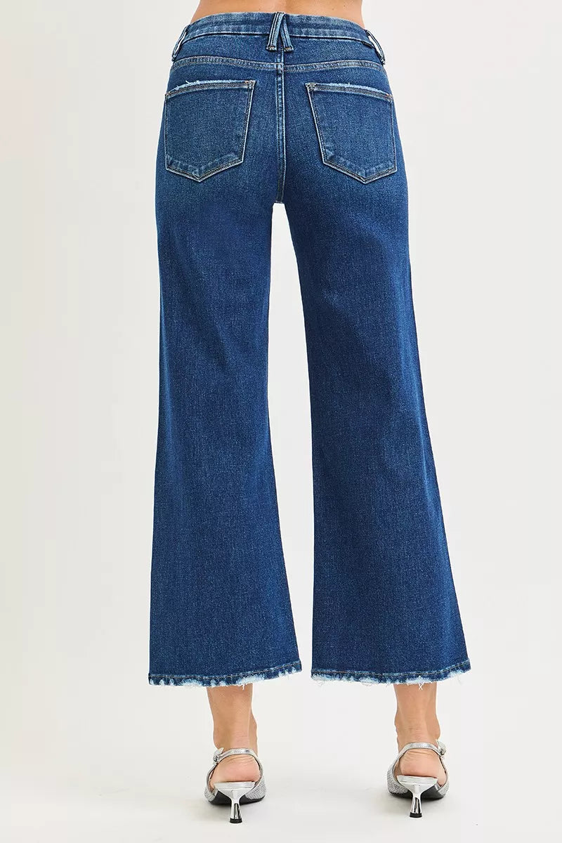Dark wash high-rise wide-leg crop jeans, back view with two patch pockets