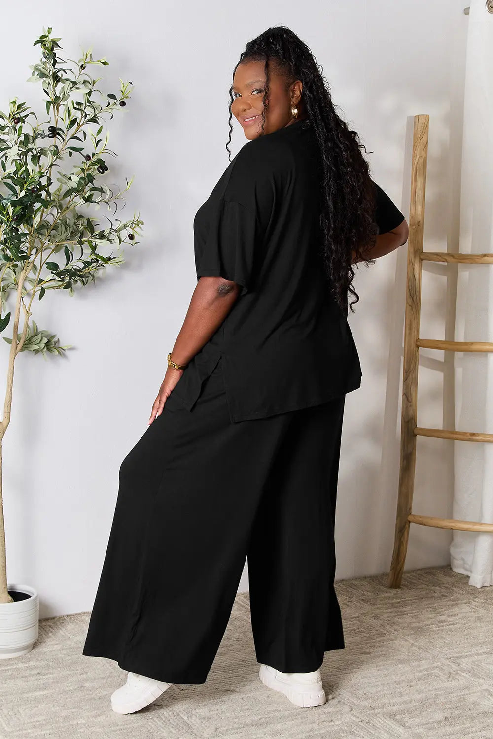 Black tunic set, back view with wide-leg pants and short sleeves
