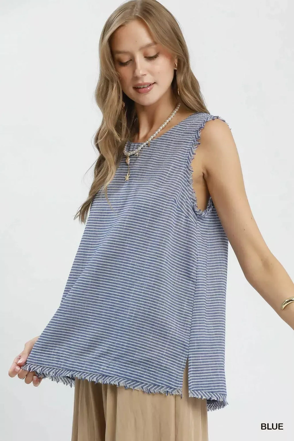 Blue striped sleeveless top with buttoned neckline and fringe-trimmed hem