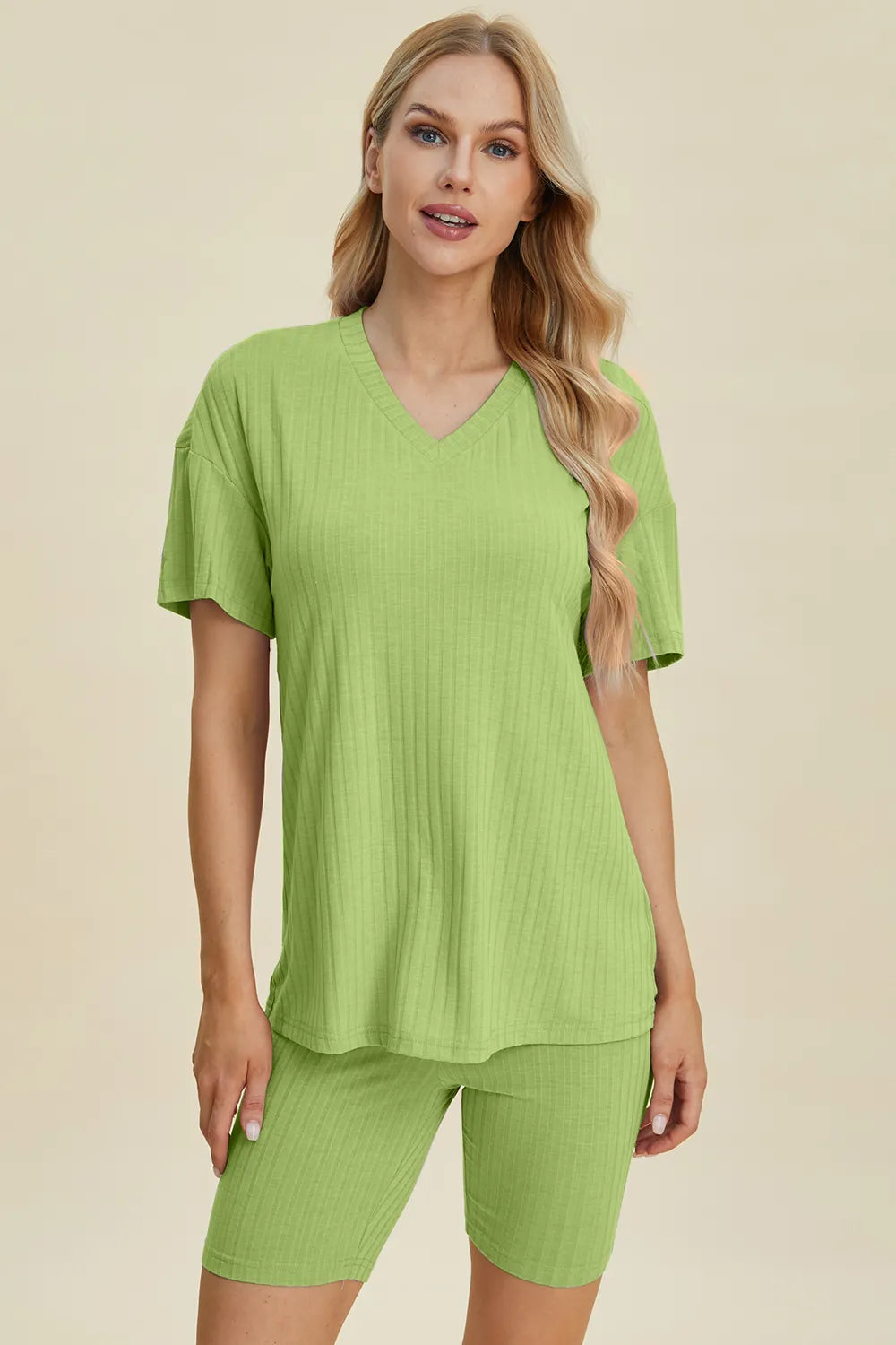 Green ribbed V-neck short sleeve top and matching biker shorts set, front view