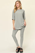 Women’s round-neck T-shirt and leggings set in light gray, draped hem