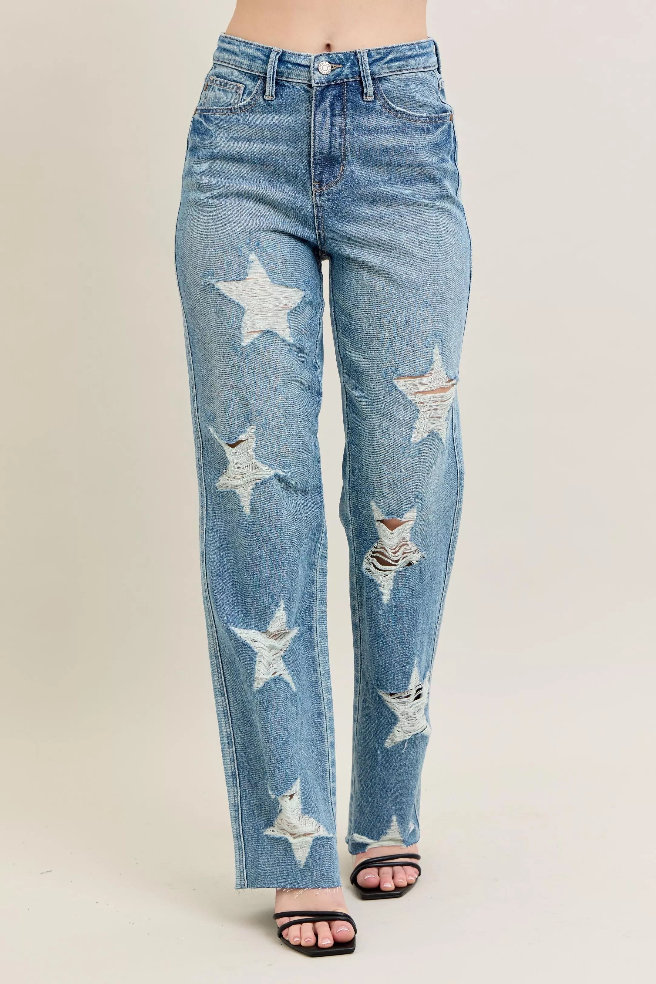 High-waist straight jeans in light wash denim with star rips at front
