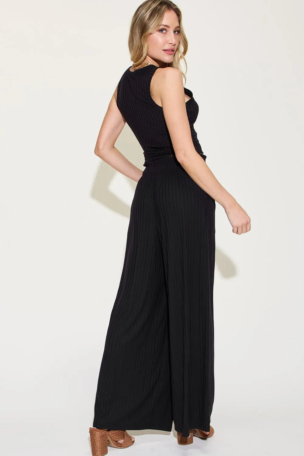 Black ribbed sleeveless tank and wide-leg pants set with high neckline