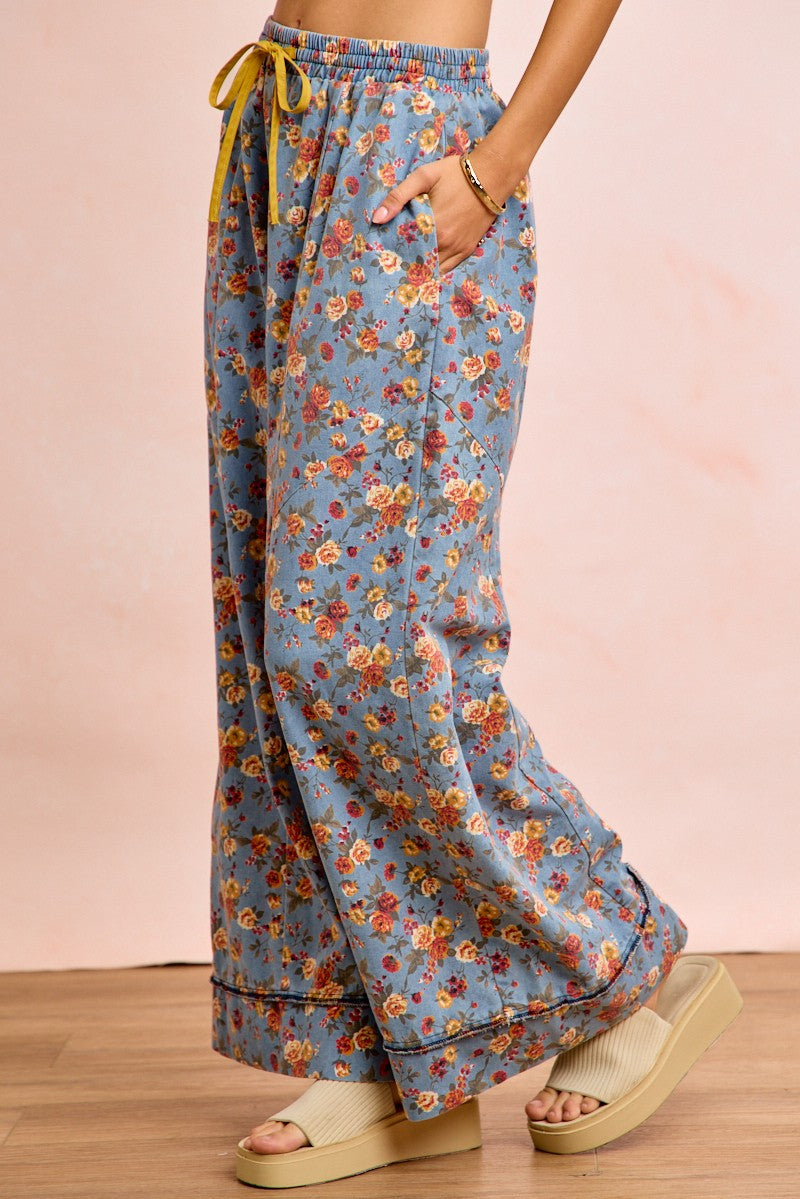 Denim-blue floral drawstring wide pants with relaxed fit and elastic waist