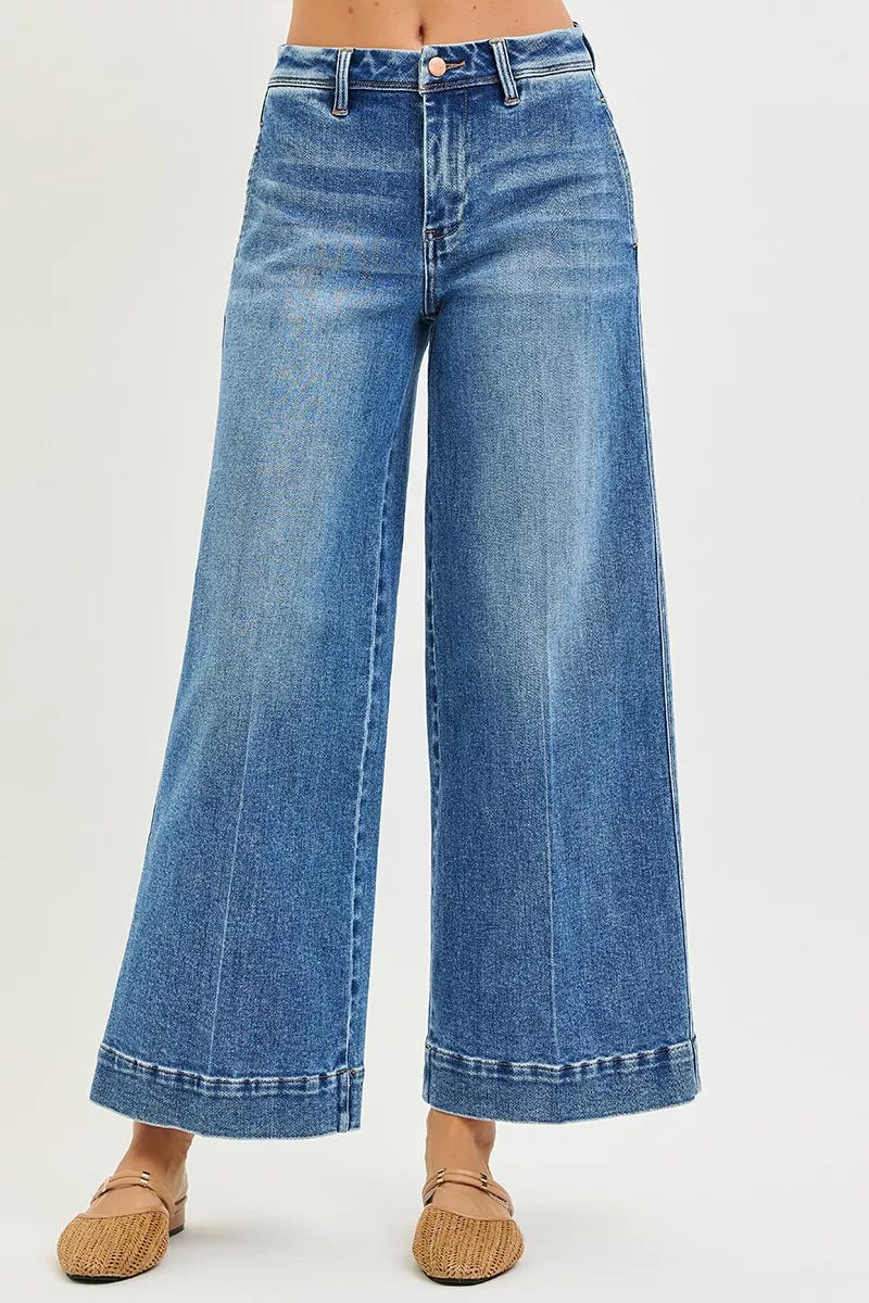 Slouchy wide-leg jeans front view with dark blue wash and relaxed ankle-length hem
