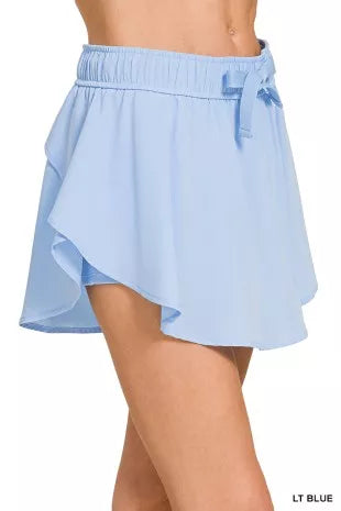Light blue active skort with layered ruffle hem and elastic waistband