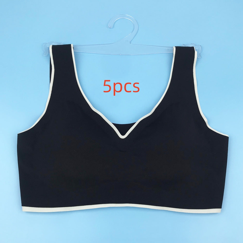 Black seamless back bra with V-neckline and wide straps, flat lay on hanger