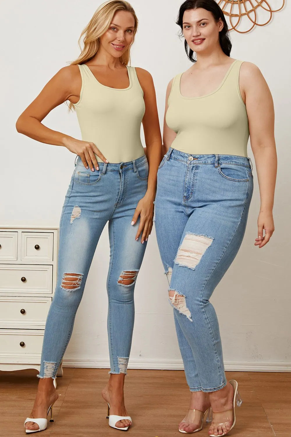 Square-neck sleeveless bodysuit, olive, worn with light-wash jeans