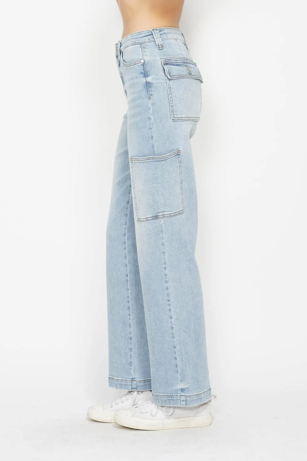 Light blue straight cargo jeans, back side view with stitched patch pockets