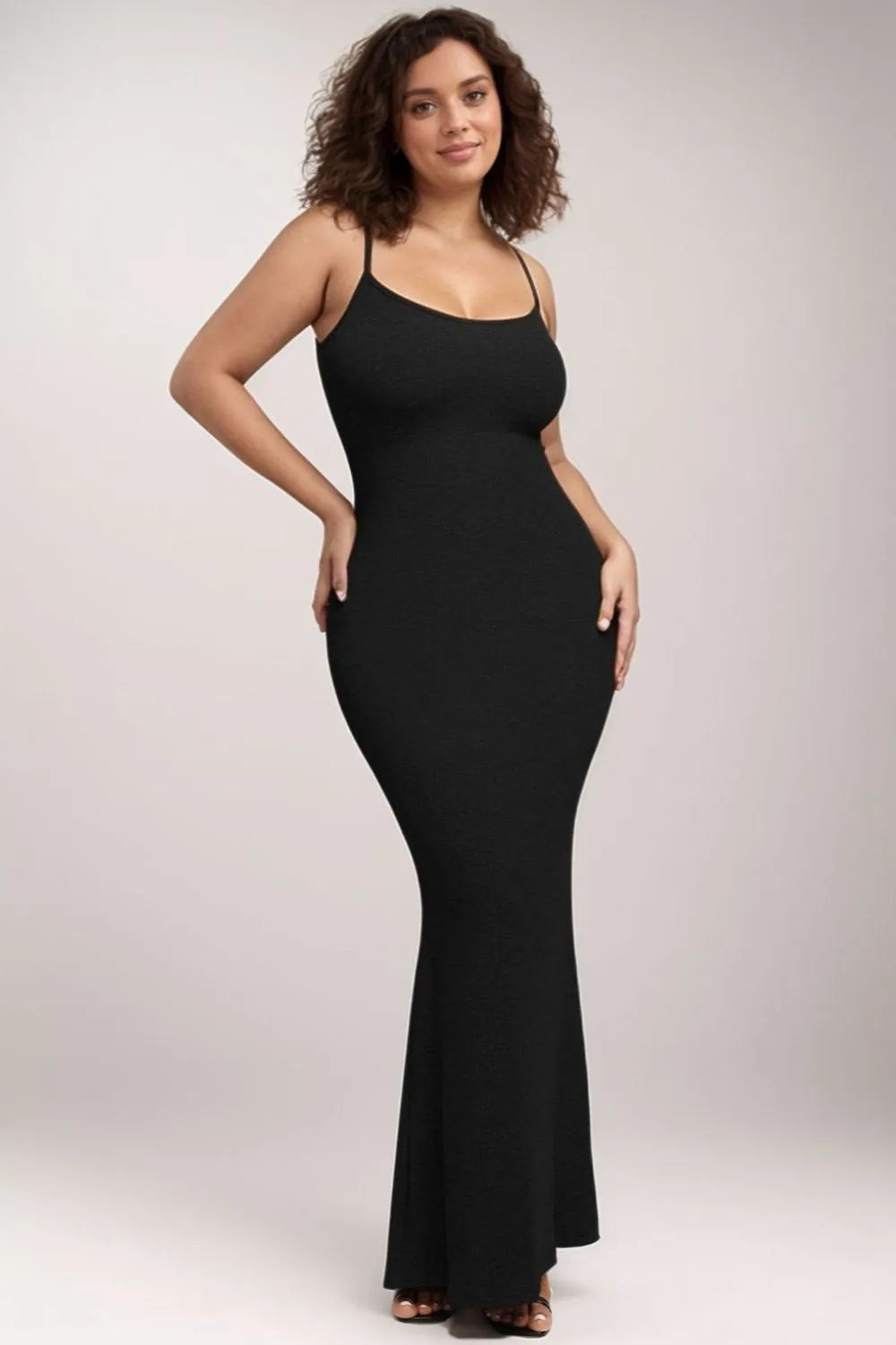 Black built-in shapewear maxi dress with narrow straps and flared hem