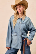 Washed denim jacket with contrast collar detail, button-front and flap pockets.