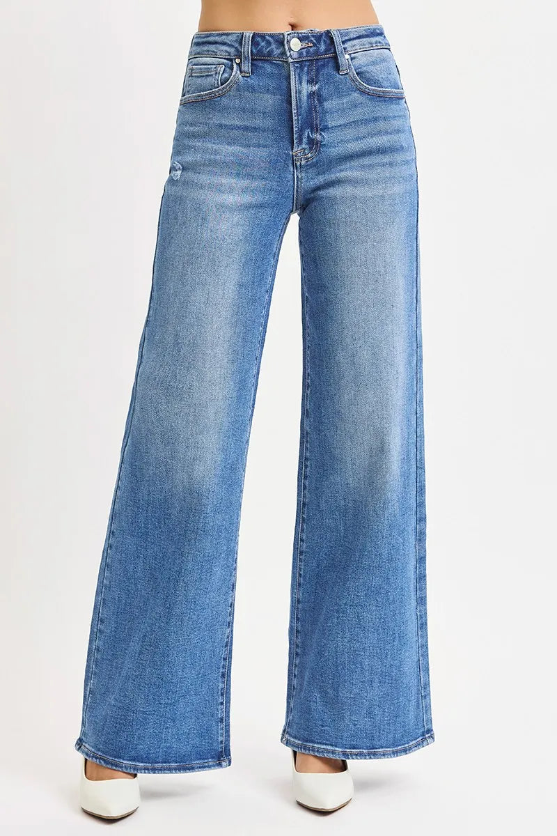 High-rise wide-leg jeans, medium wash blue; front pockets and belt loops.