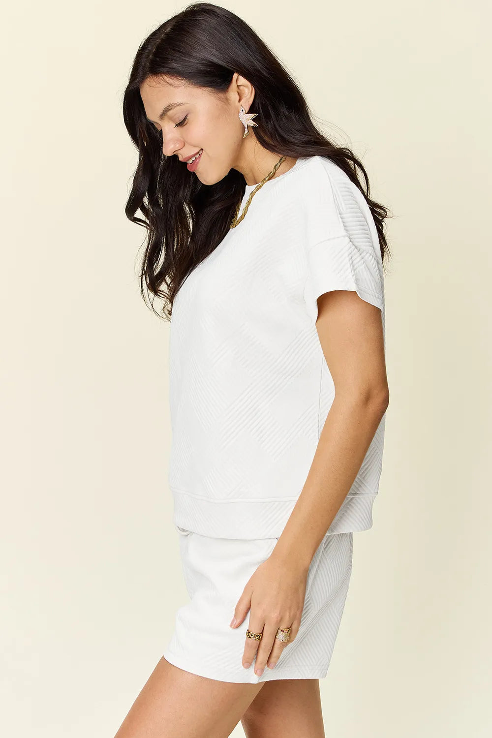 White short-sleeve textured T-shirt and drawstring shorts set, side profile