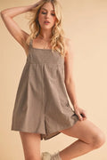 Chocolate plaid square-neck romper with spaghetti straps and flared short skirt