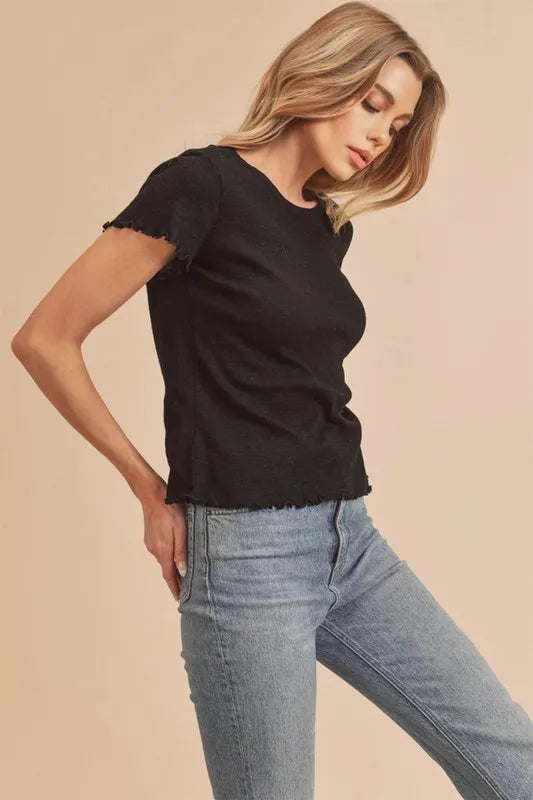 Black round-neck T-shirt with scalloped lettuce edge on sleeves