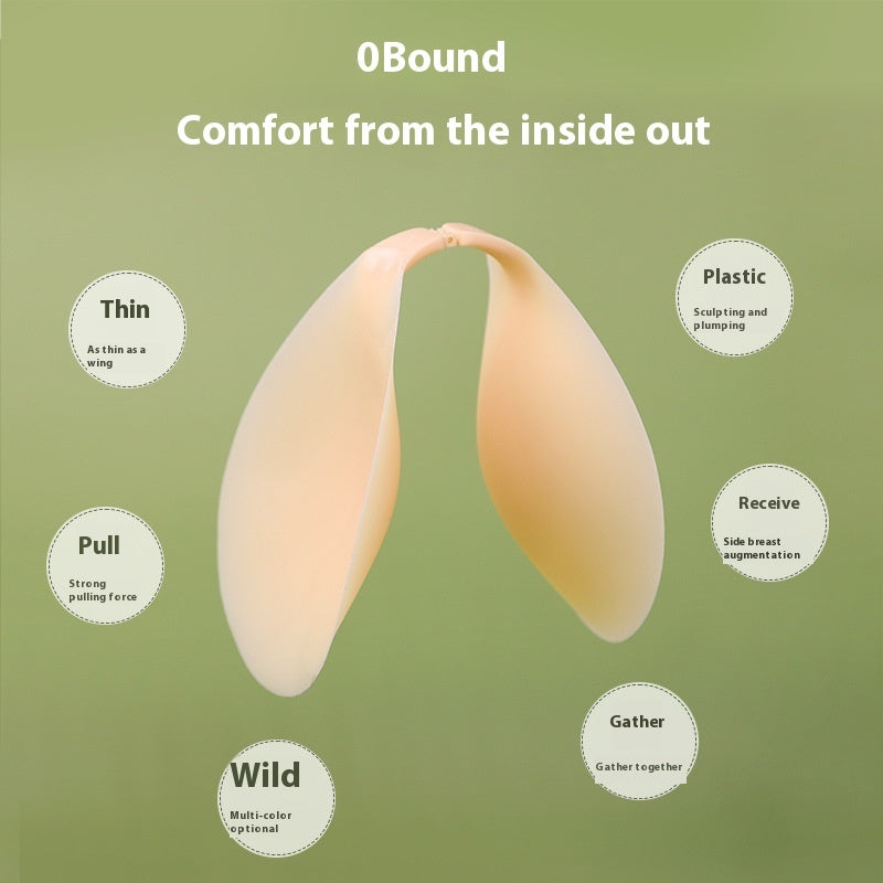 Silicone adhesive bra cups, light nude peach color with central joining seam