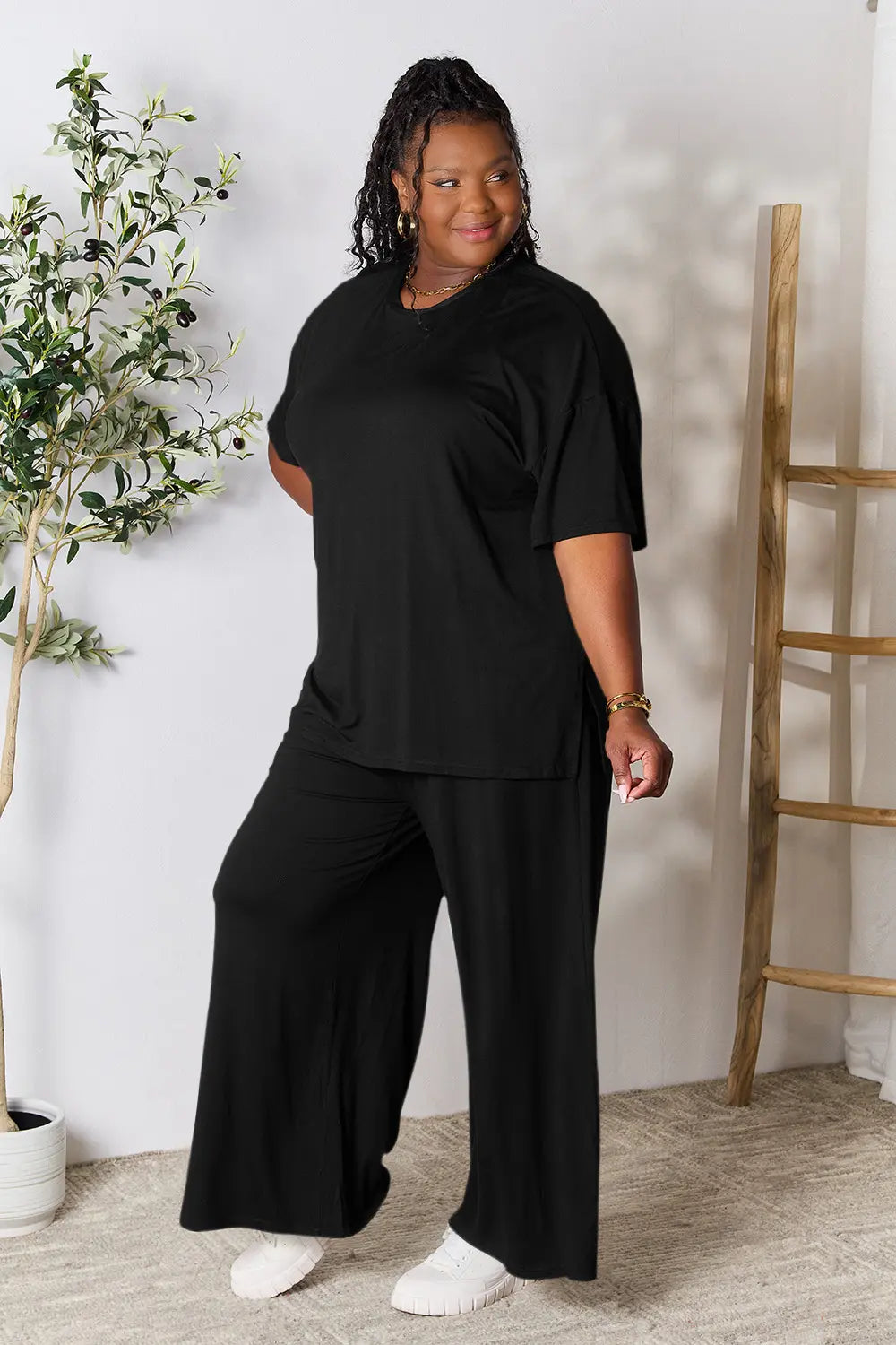 Black round-neck tunic top and wide-leg pants set