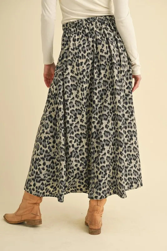 Leopard midi skirt with front pleats and dark leopard pattern