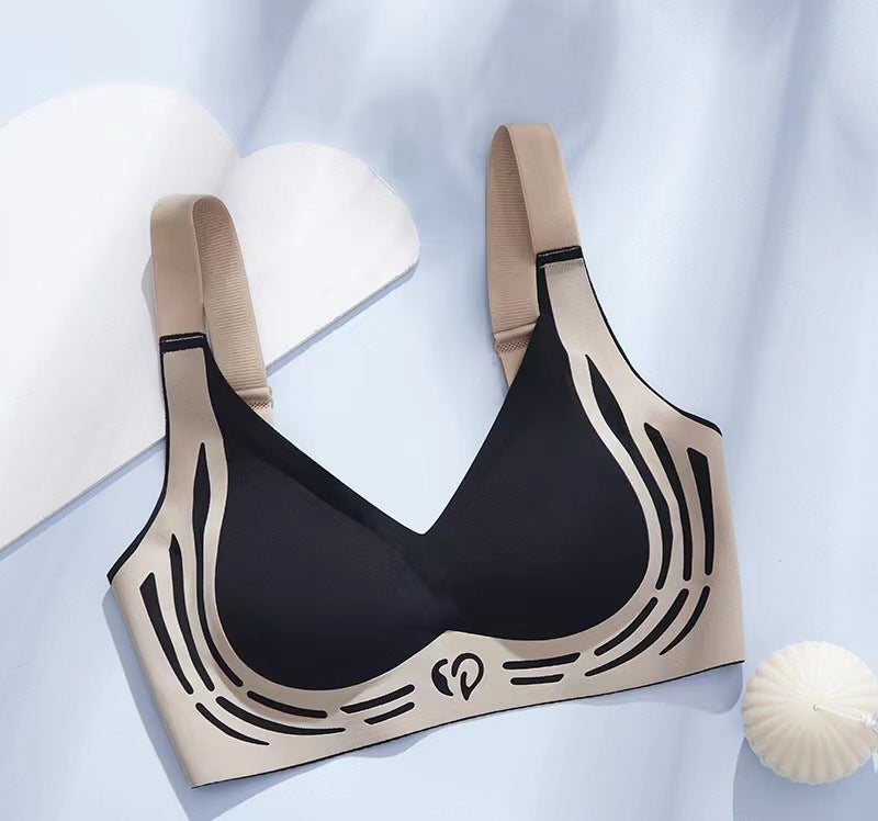 Plus size soft support adjustable sports bra, black with beige straps and white graphic trim