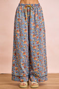 Denim-blue floral wide-leg pants with elastic waist and drawstring tie