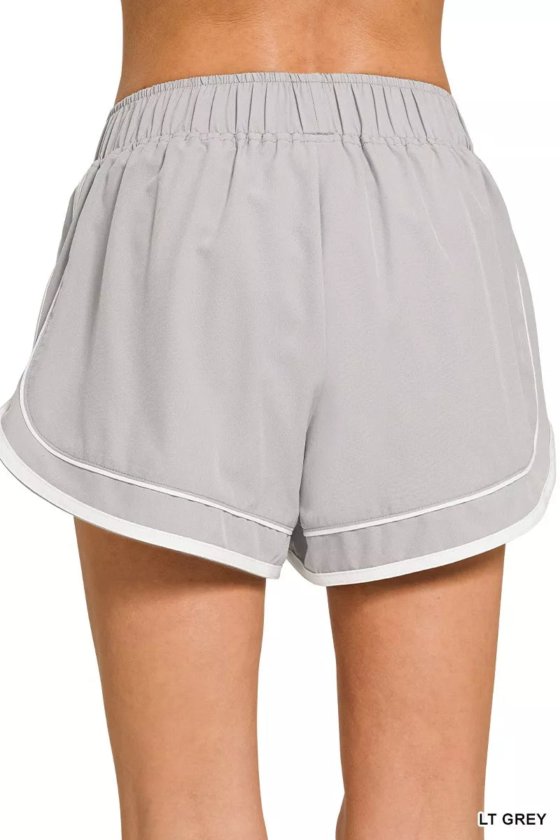LT GREY dolphin shorts, soft woven with elastic waist and contrast-trim hem, lined