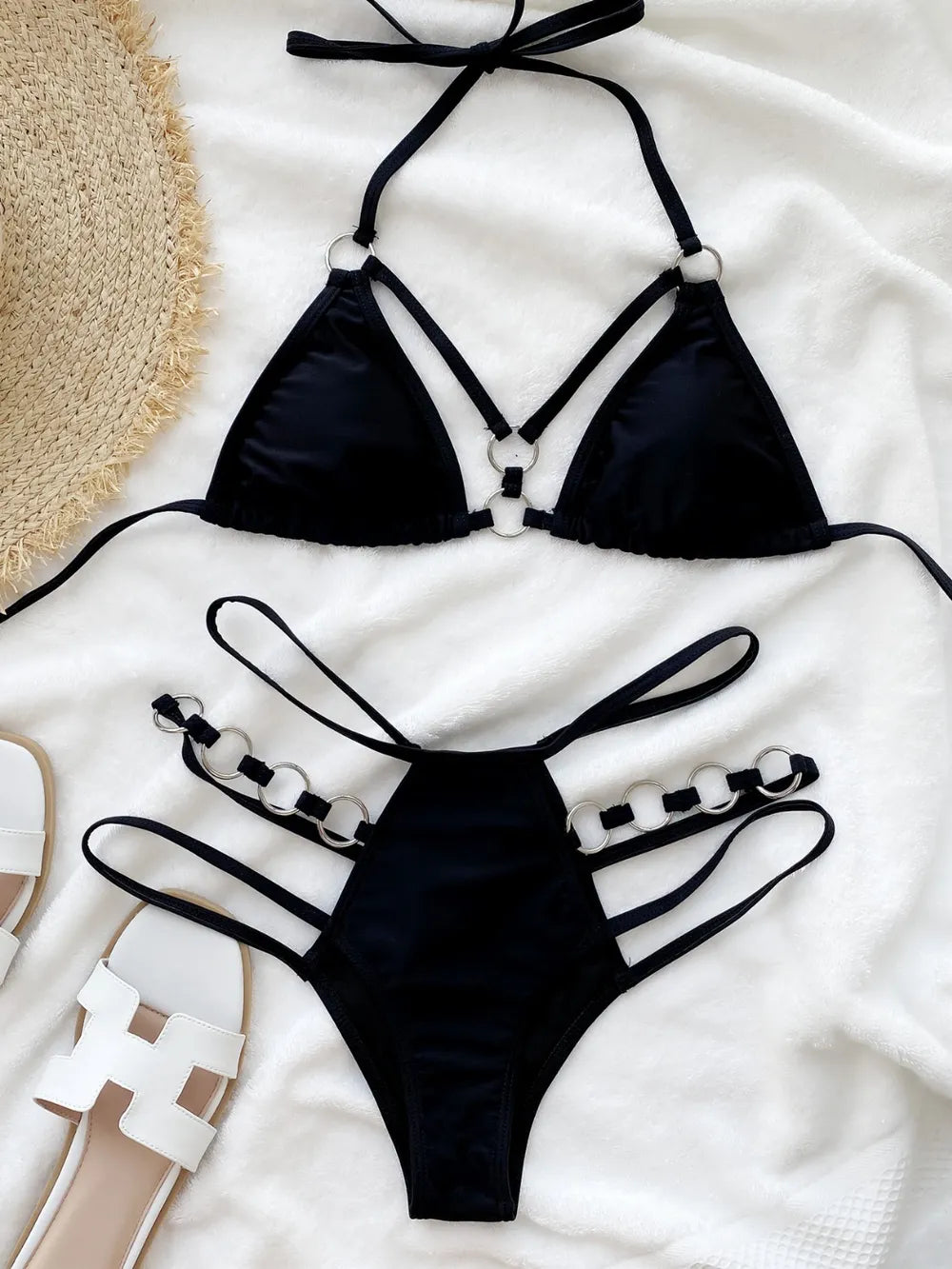 Black cutout two-piece bikini set: halter triangle top and high-cut bottom
