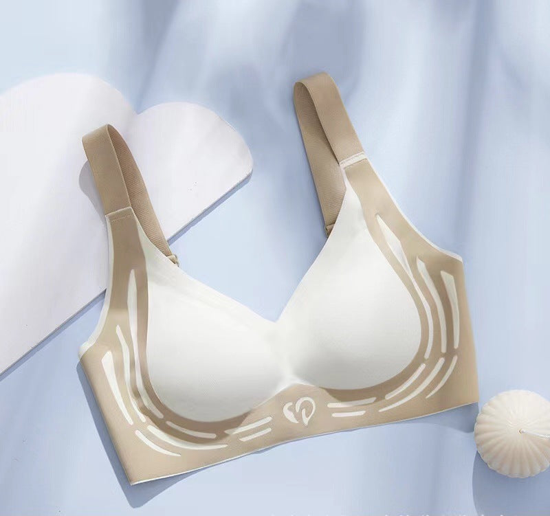 Adjustable sports bra in cream with racerback straps and abstract line print
