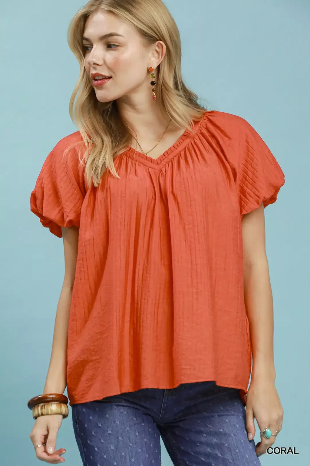 Coral gathered V-neck top with short puff sleeves