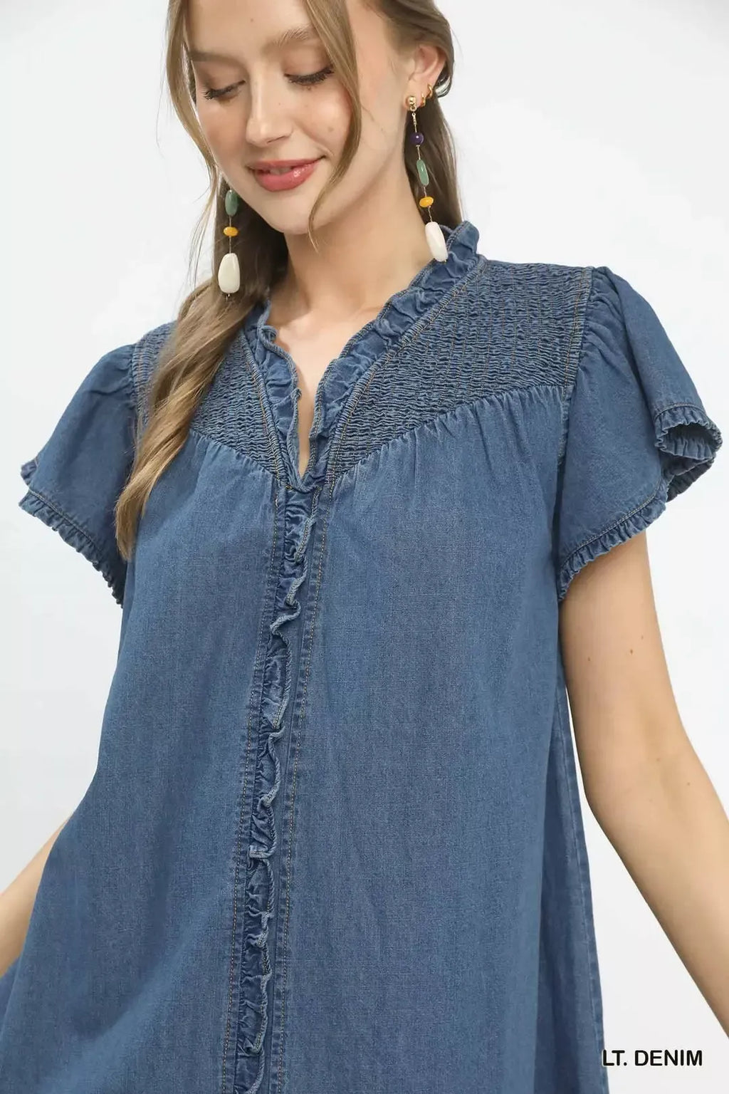 Denim dress bodice detail: ruffled yoke with button placket