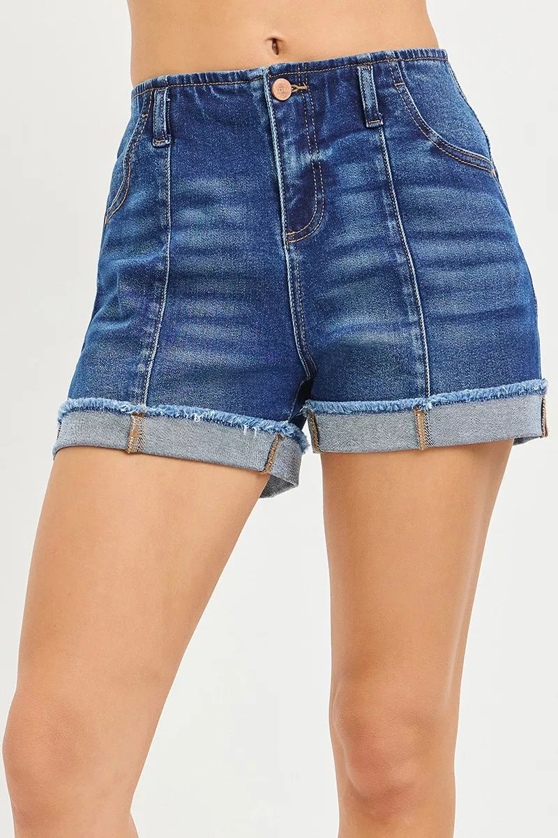Slouchy cuffed denim shorts in dark wash, frayed cuff hem and front seam stitching