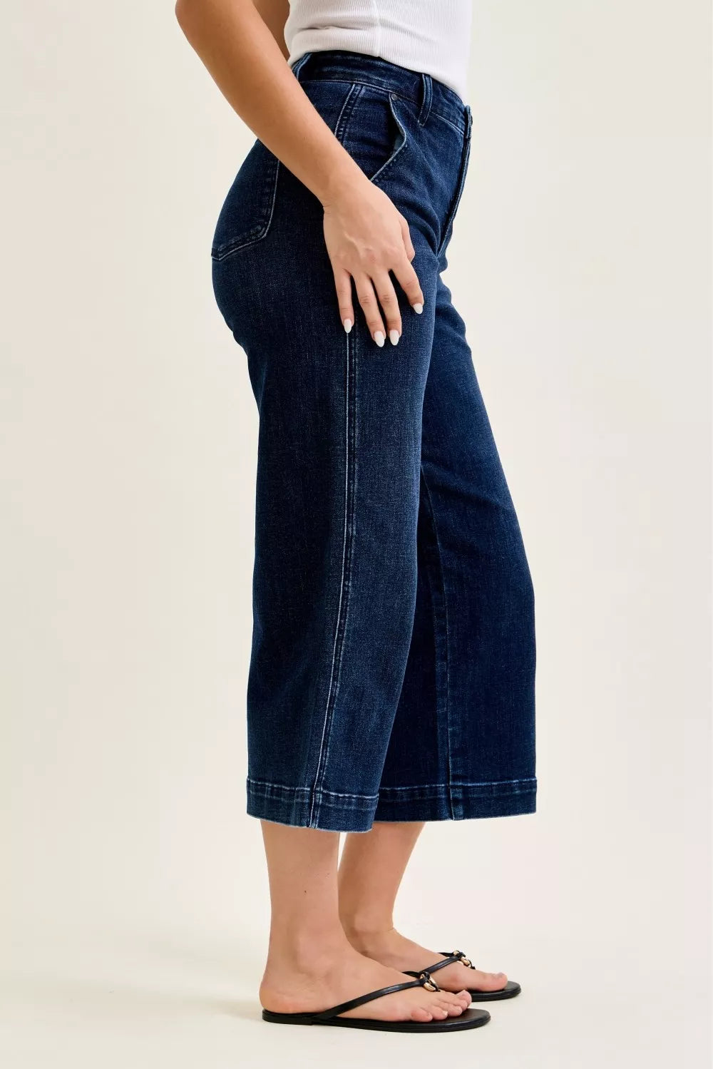 Side view: high waist wide-leg ankle jeans, dark wash DK, cropped hem