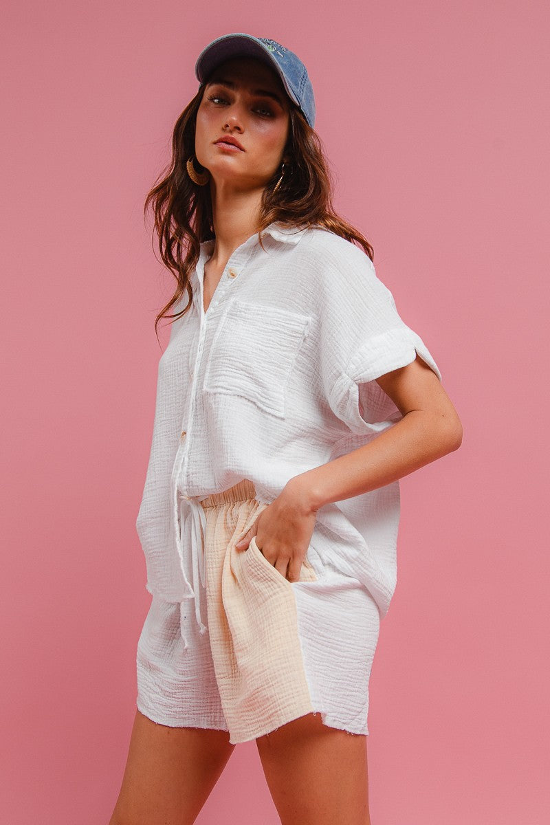 Cream wrinkled gauze short-sleeve shirt with pocket, worn with elastic-waist shorts