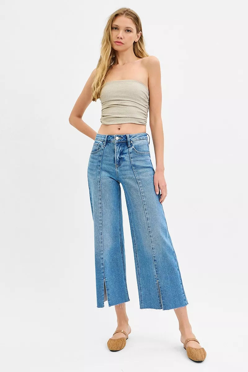 Medium-wash wide-leg crop jeans with front slit, mid-rise tummy control