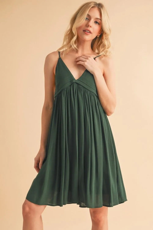 Dark green ruched plunge mini cami dress with gathered bodice