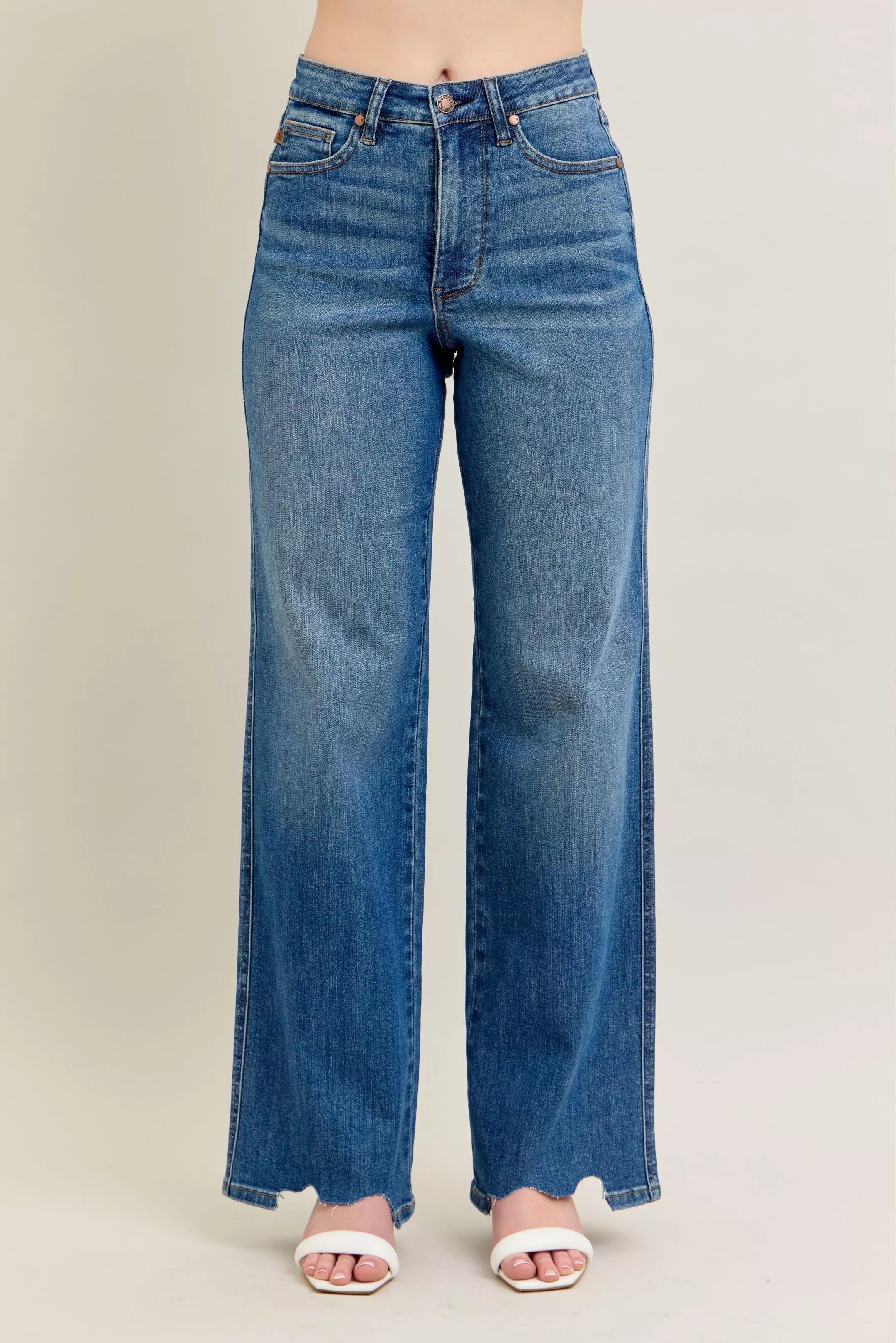 High-waist wide-leg jeans in medium wash with frayed, distressed hem