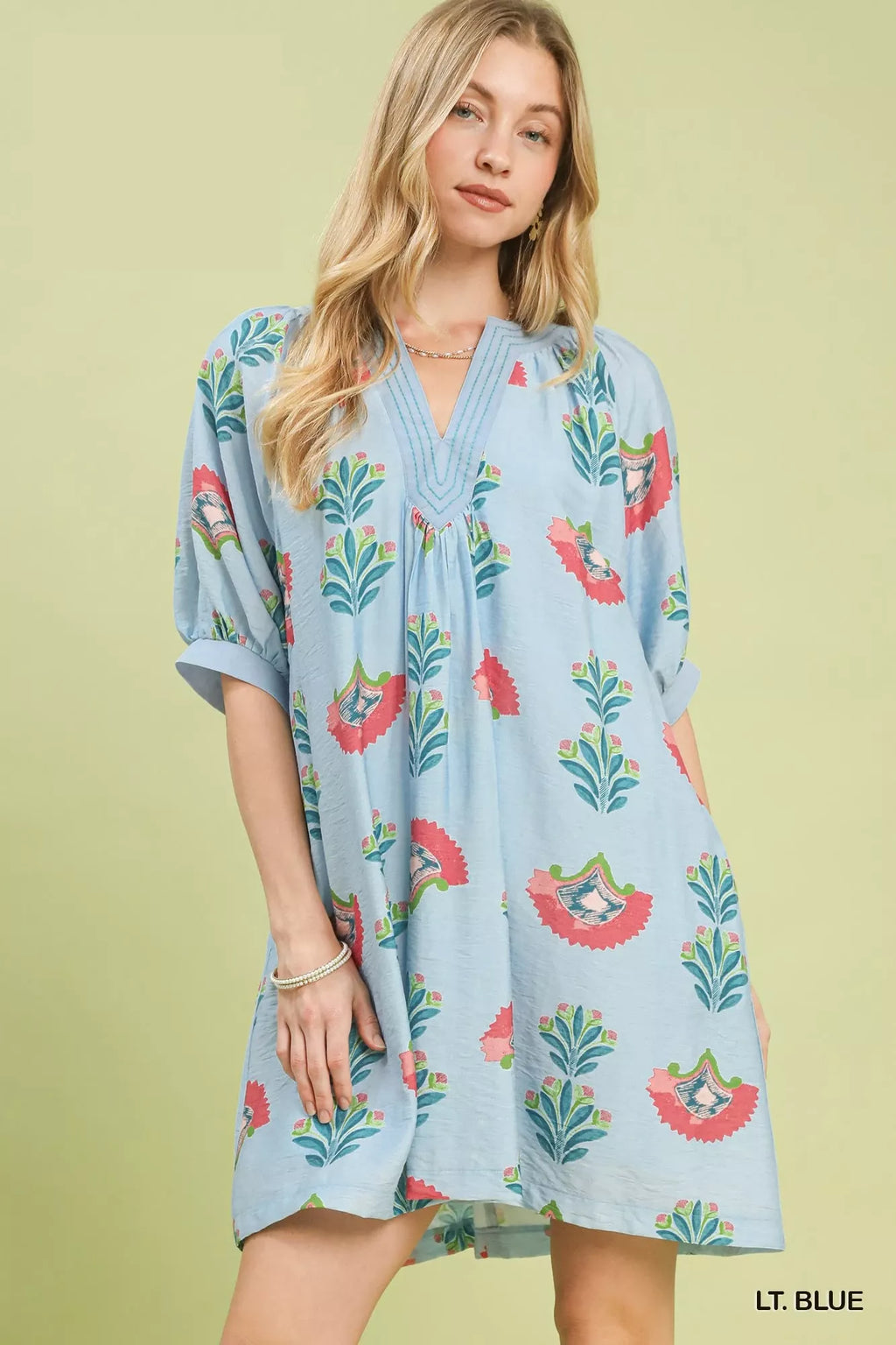 Light blue mini dress with colorful bird and leaf print, V-neck