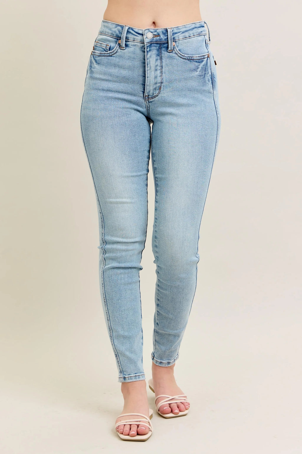 Light wash skinny jeans, high-rise, full-size plus, front view