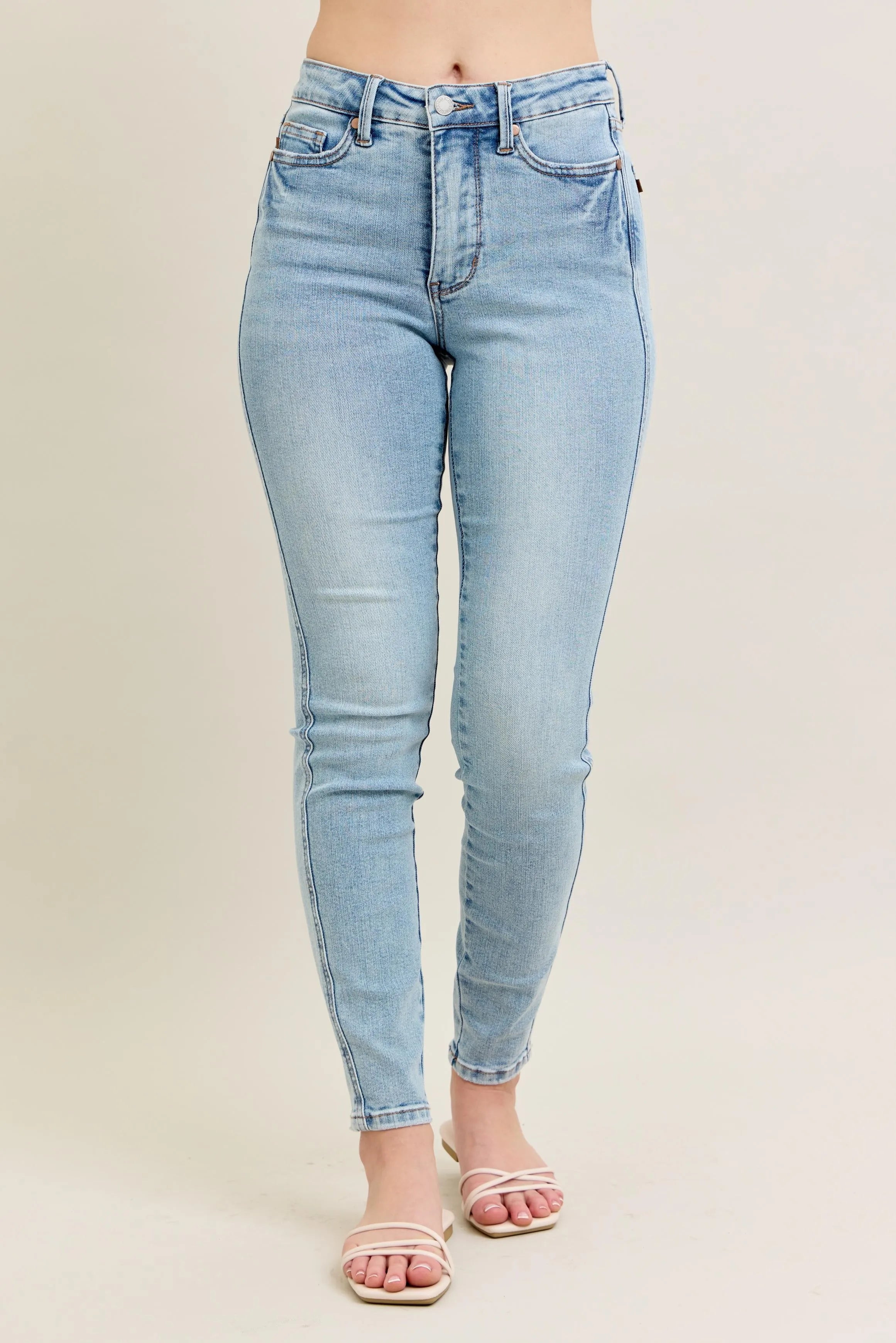 Light wash skinny jeans, high-rise, full-size plus, front view