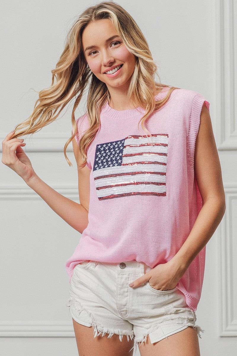 Pink sleeveless knit top with sequin American flag patch