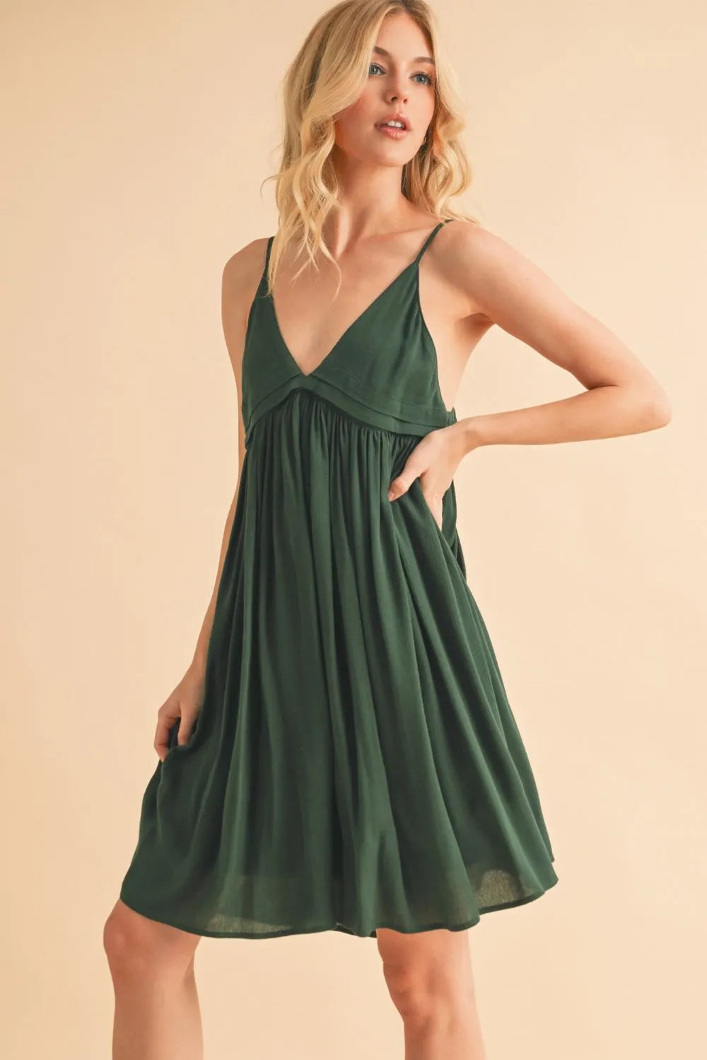 Dark green mini cami dress, V-neck plunge and ruched skirt